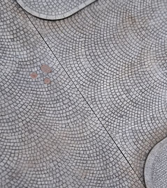 Arched-pattern paved road T-junction