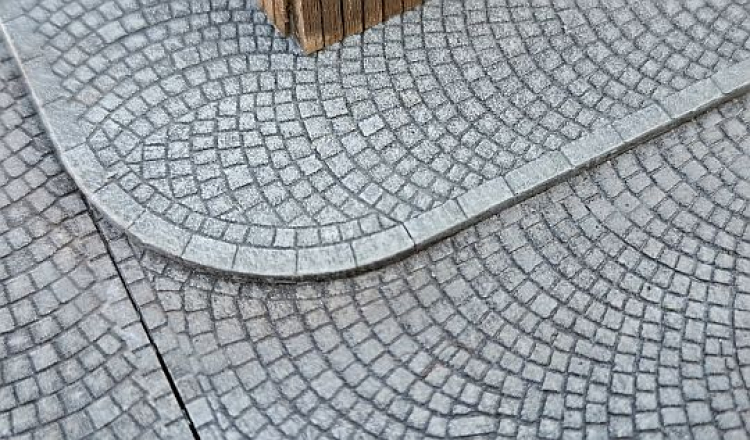 Straight footpath with arched paving
