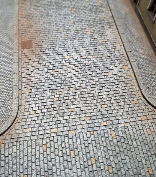 Straight cobblestone road, T-junction